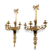 A Pair of Louis XVI Style Gilt Bronze Three-Light Wall Sconces