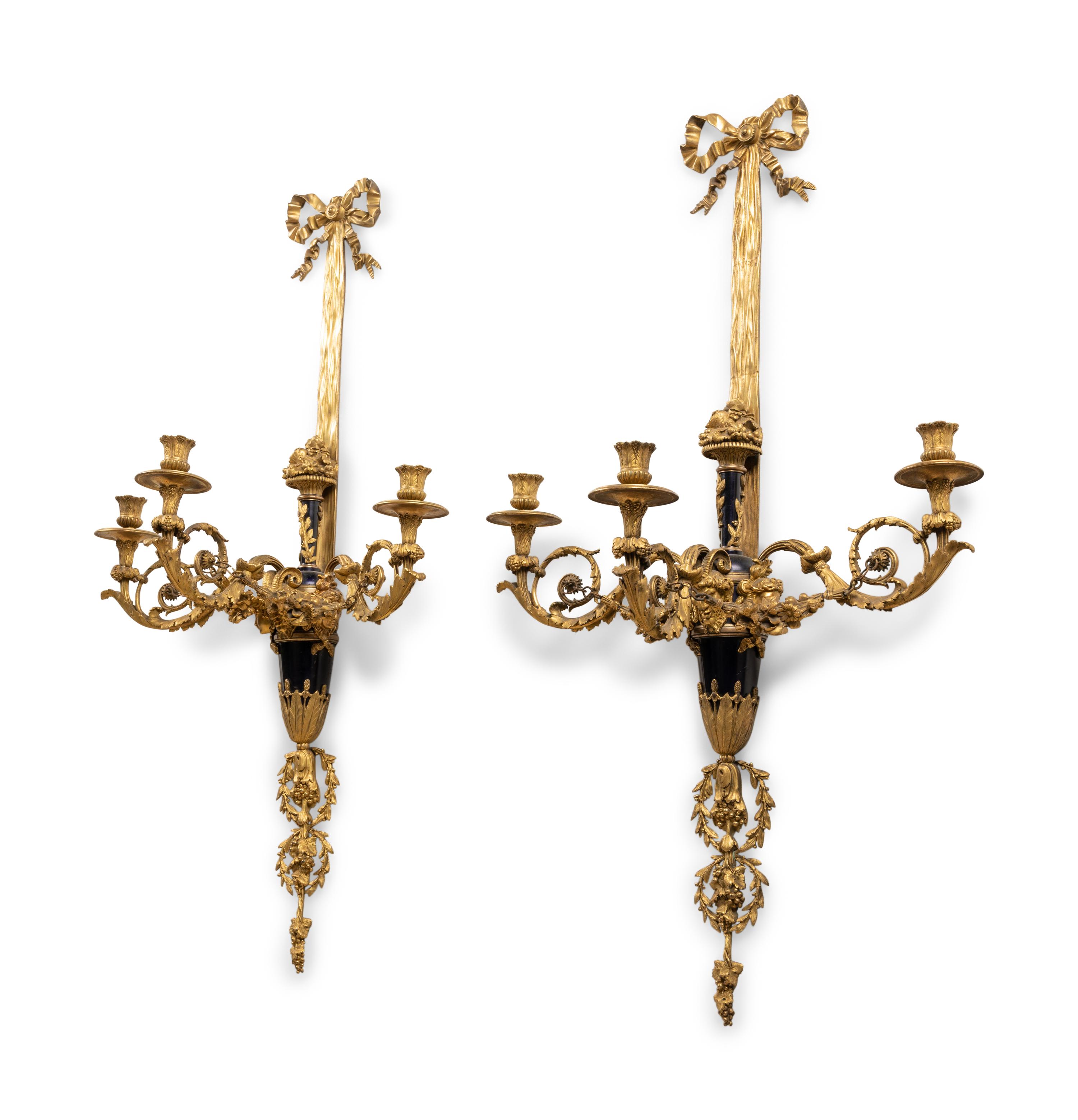 A Pair of Louis XVI Style Gilt Bronze Three-Light Wall Sconces