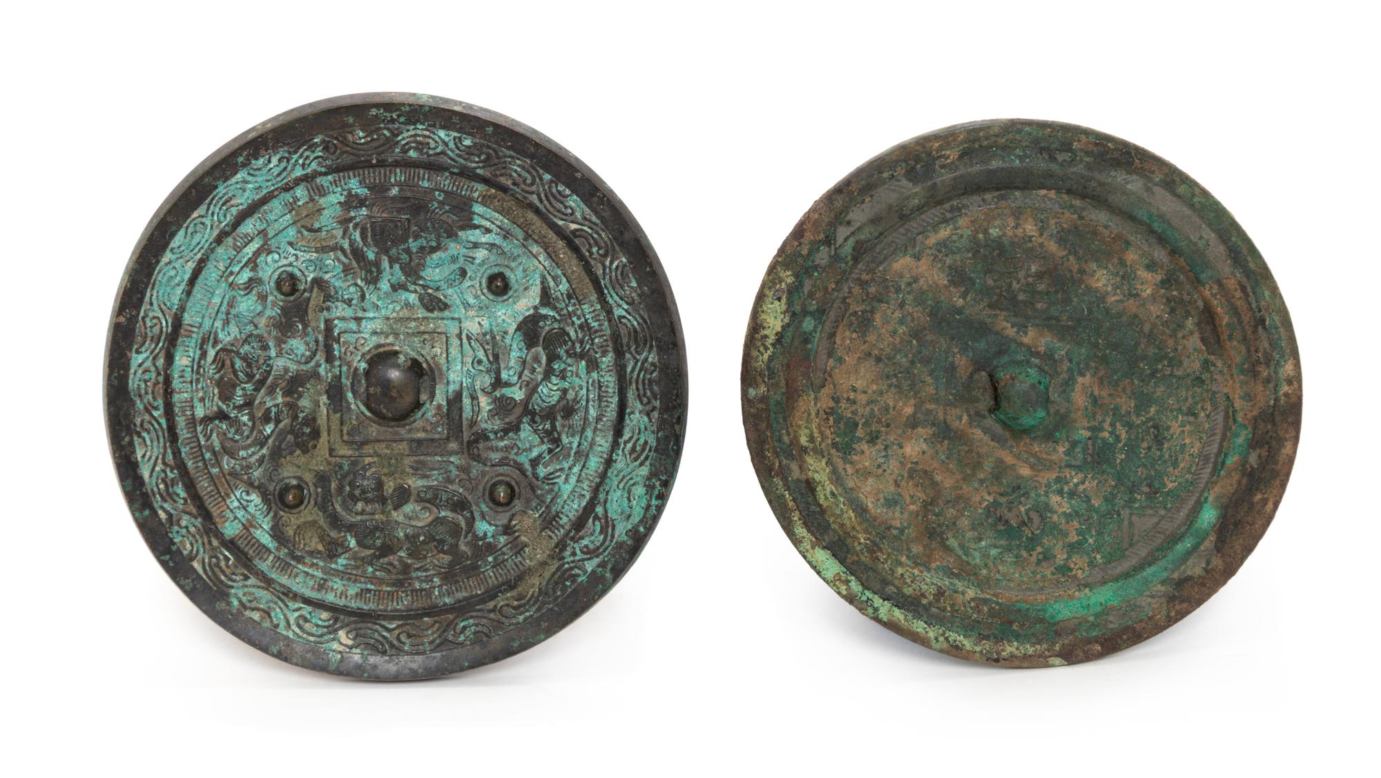 Two Chinese Bronze Mirrors Diameter of largest 7 1/2 inches.
