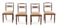 A Set of Four Regency Brass Inlaid Dining Chairs