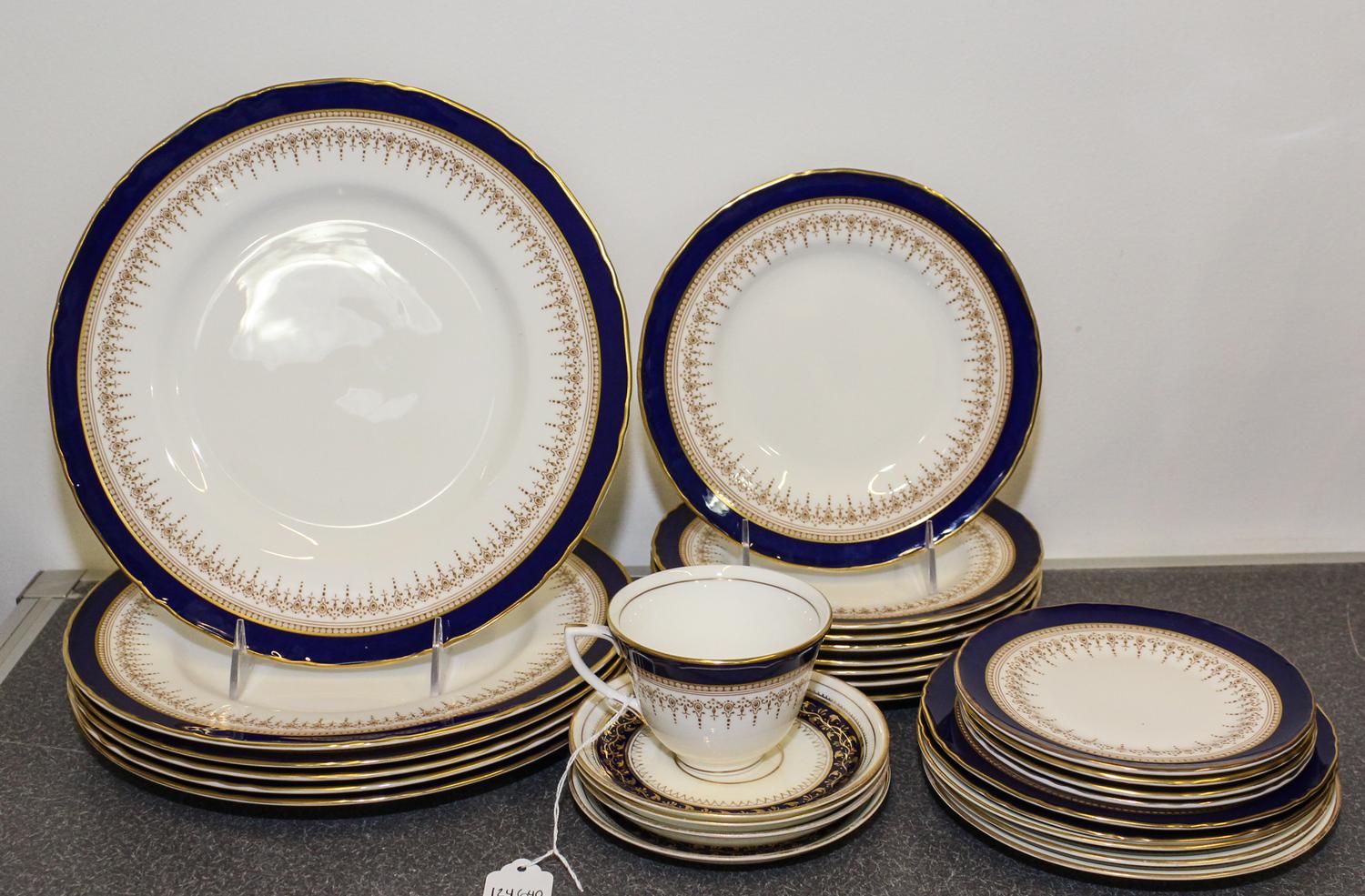 A Royal Worcester Porcelain Dinner Service for Twelve