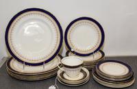 A Royal Worcester Porcelain Dinner Service for Twelve