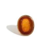 A Neoclassical Gold and Carnelian Finger Ring with a Male Portrait Head