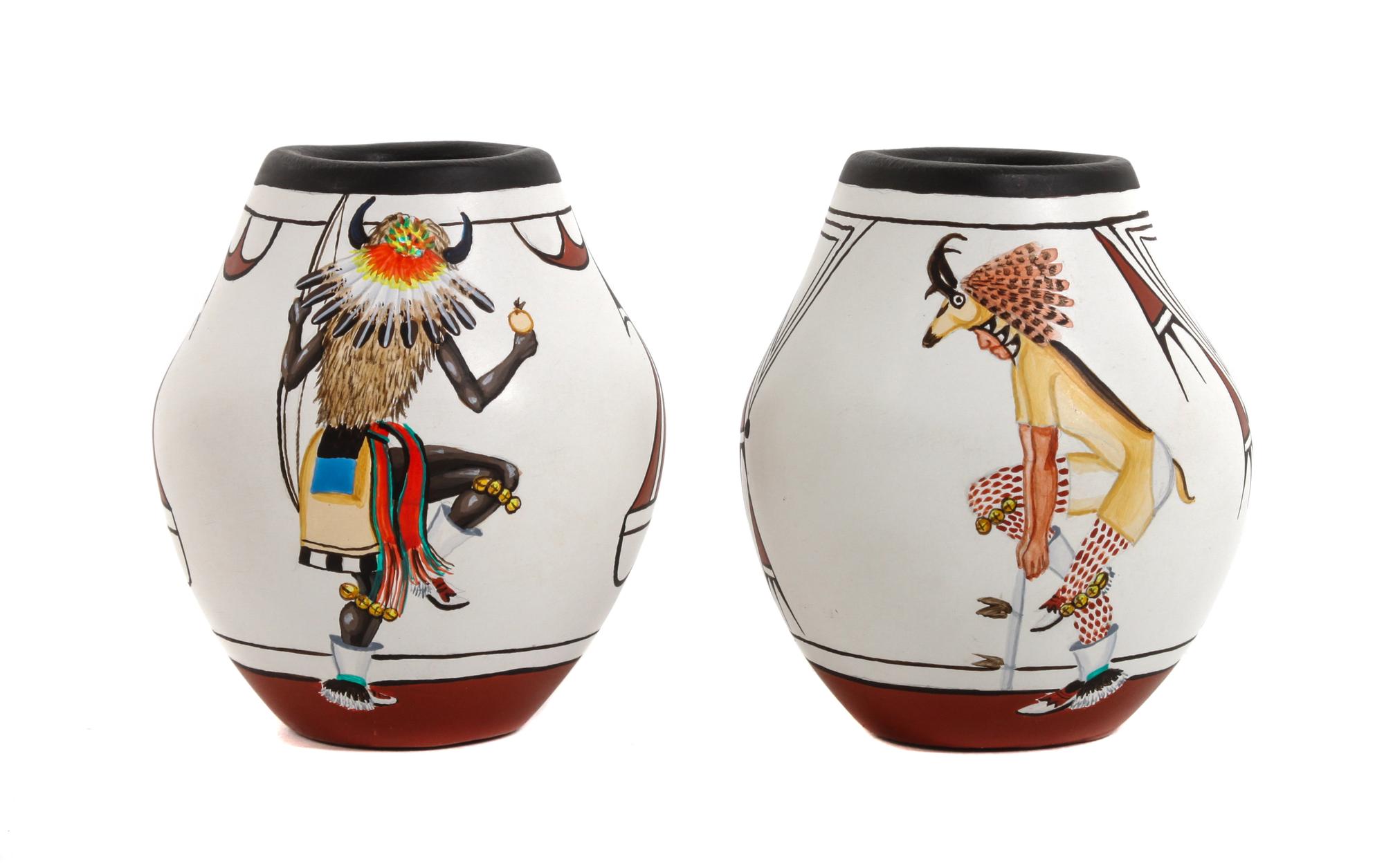 Elizabeth Toya Medina (b. 1956) Jemez/Zia Height of each 2 1/2 x diameter 2 1/8 inches.