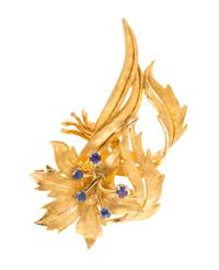 A 14 Karat Yellow Gold and Sapphire Lily Motif Brooch, 7.50 dwts.