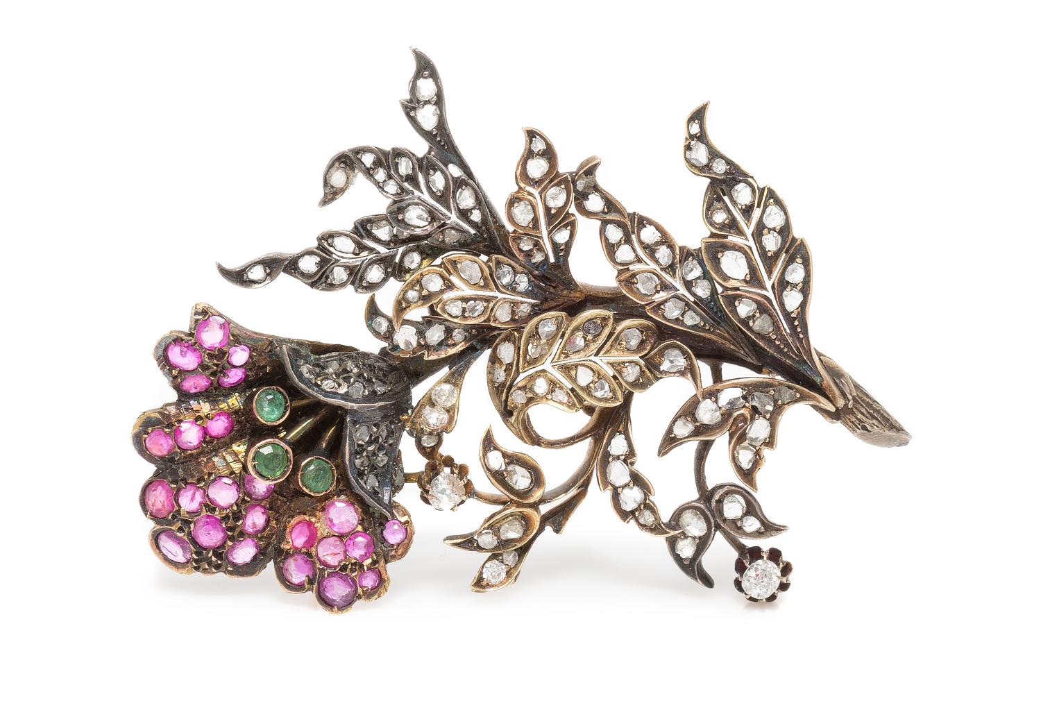 A Silver Topped Gold, Ruby, Diamond and Emerald Brooch, 15.00 dwts.