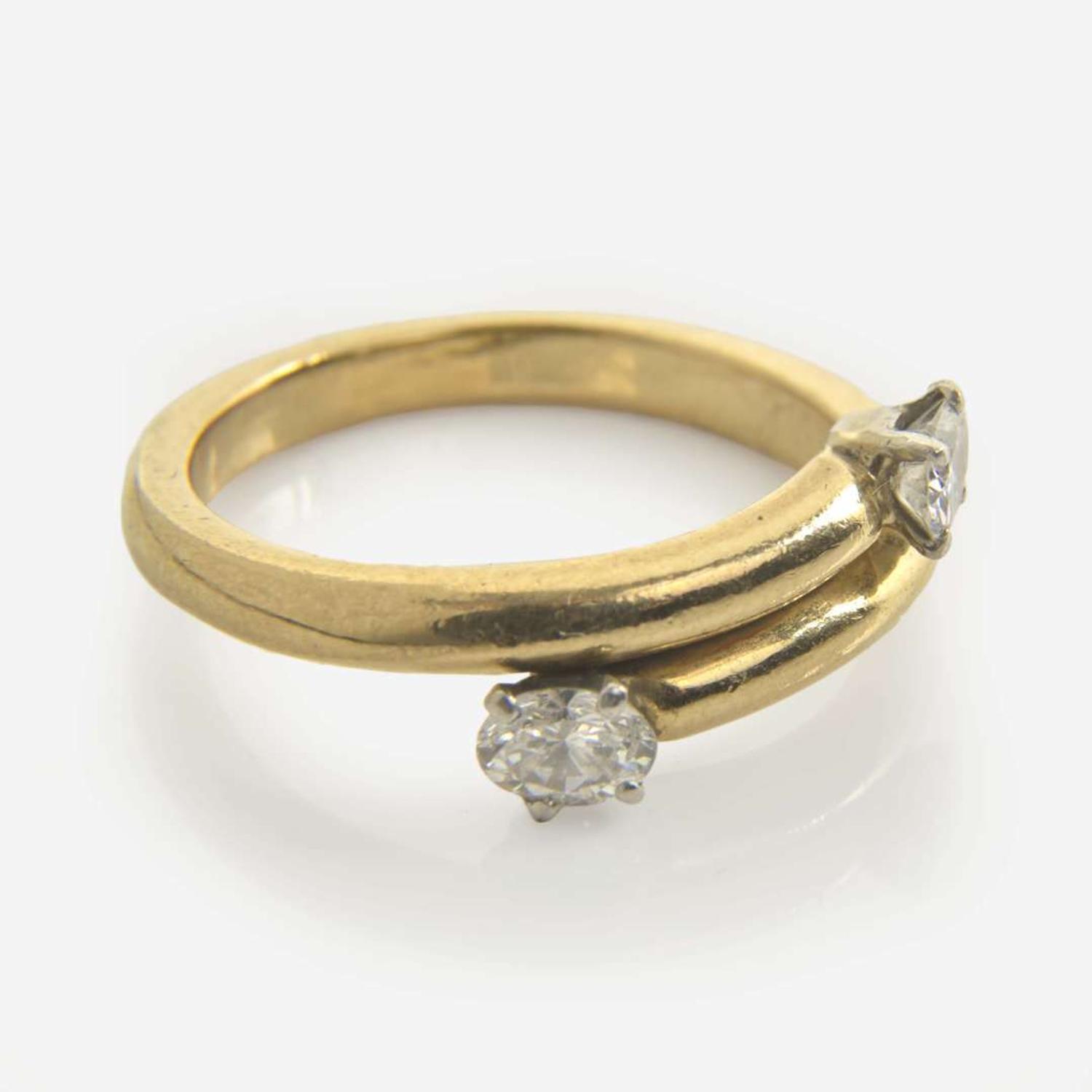A Contemporary Gold and Diamond Ring and Necklace