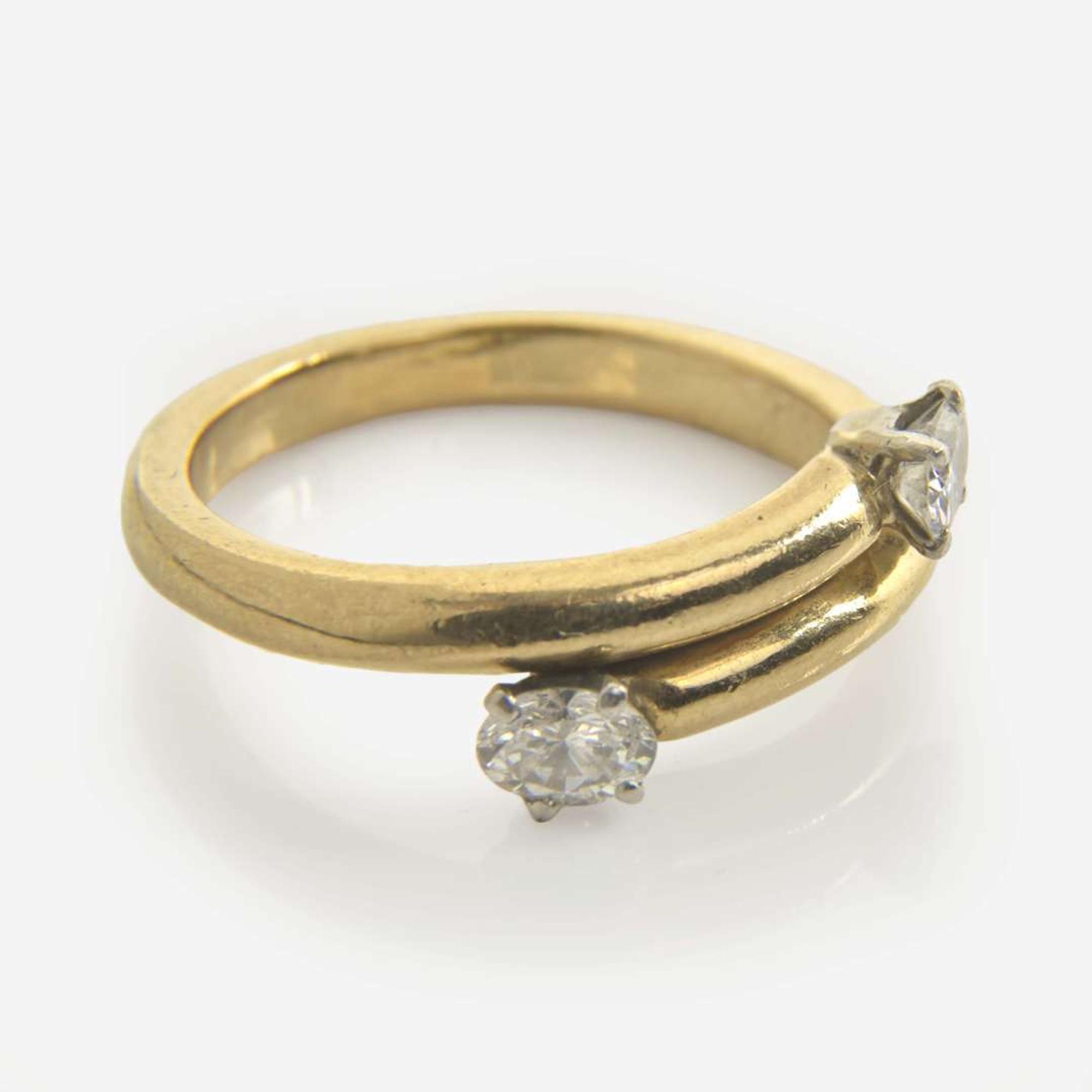 A Contemporary Gold and Diamond Ring and Necklace
