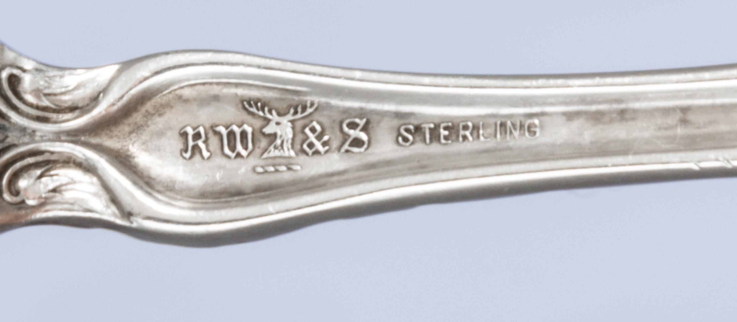 An American Art Nouveau Silver Serving Spoon, R. Wallace & Sons Mfg. Co., Wallingford, CT, monogrammed GFS on the underside.