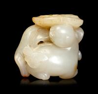 A White Jade 'Cat and Butterfly' Carving