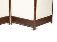 A Victorian Carved Mahogany and Parcel Gilt Faux-Bamboo Upholstered Four-Panel Screen