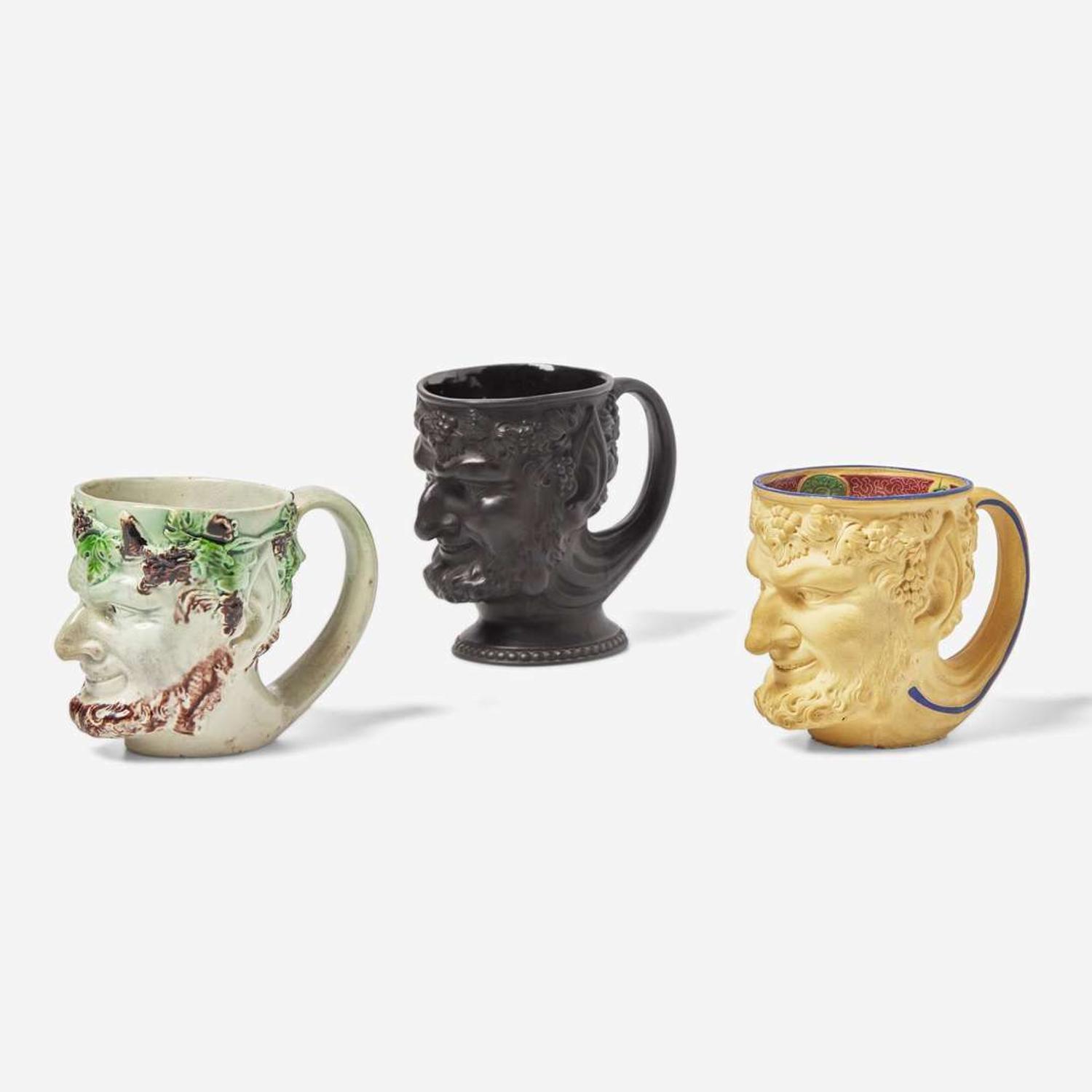 Three Turner Pottery stoneware and glazed earthenware satyr head mugs England, circa 1800