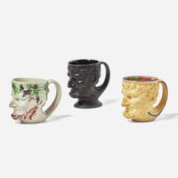 Three Turner Pottery stoneware and glazed earthenware satyr head mugs England, circa 1800
