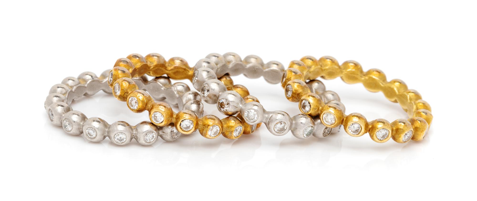 A Collection of White and Yellow Gold and Diamond Eternity Rings,