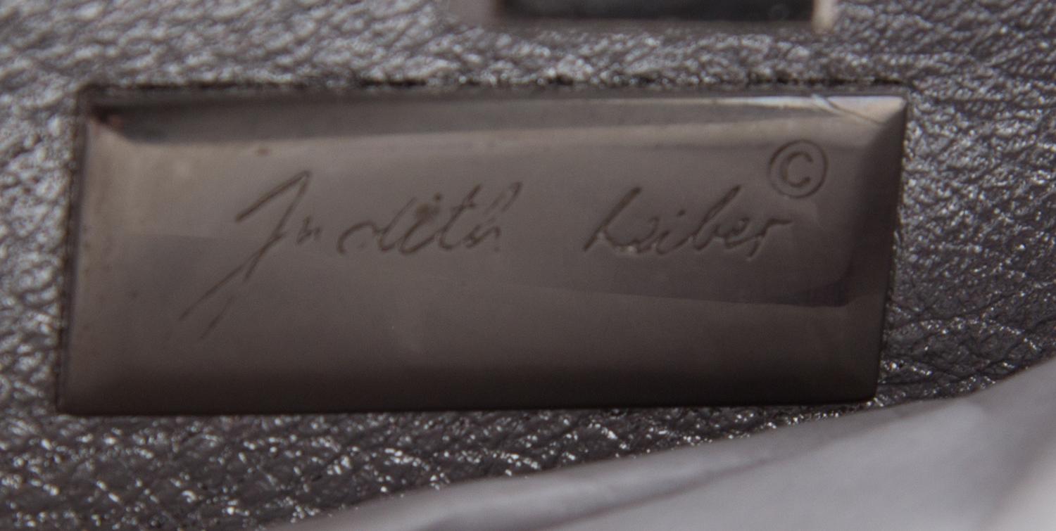A Judith Leiber Silver Minaudiere Clutch, 6.5" x 3.5" x 2".