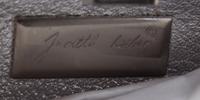 A Judith Leiber Silver Minaudiere Clutch, 6.5" x 3.5" x 2".
