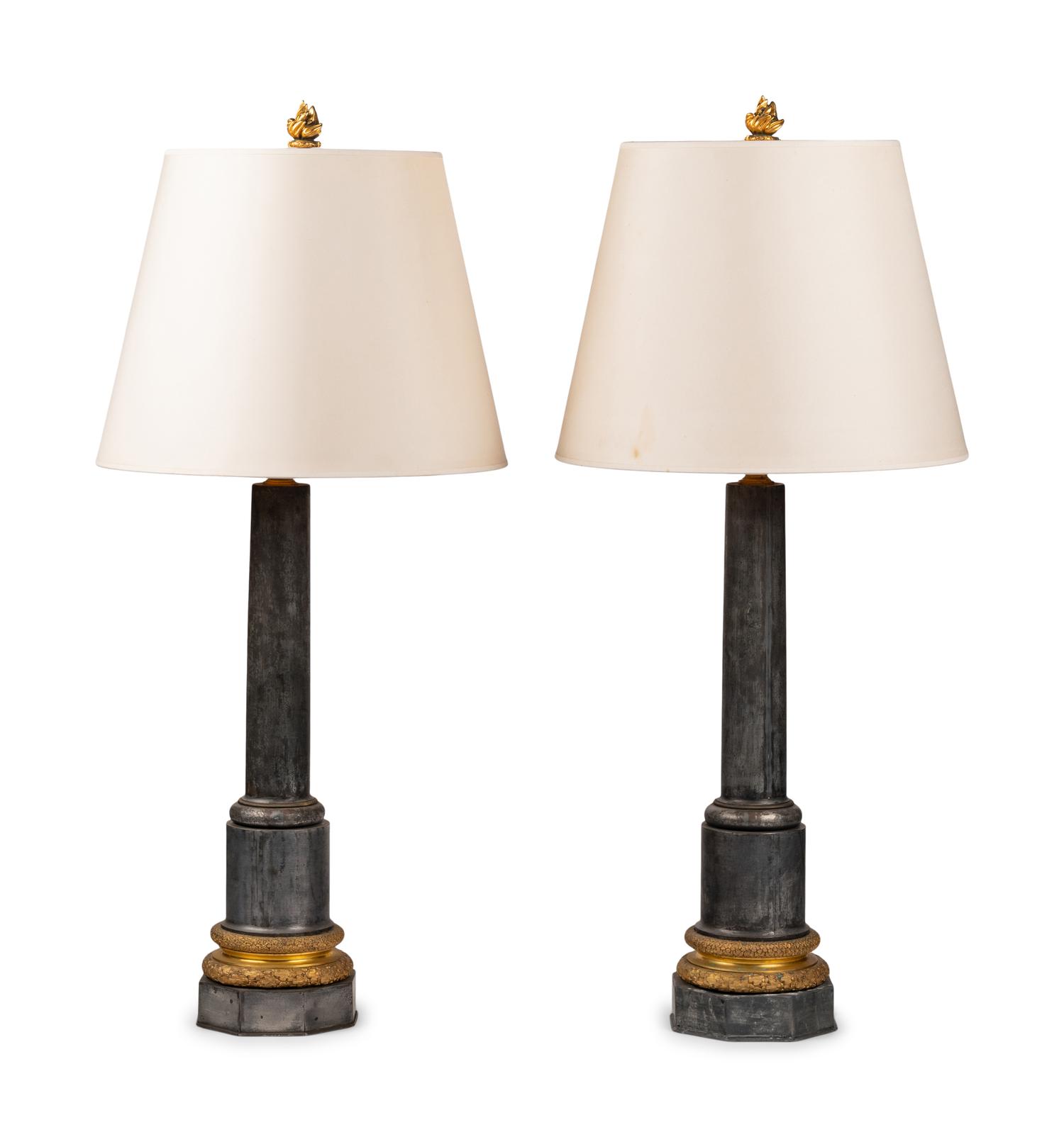 A Pair of French Gilt Bronze and Steel Columnar Lamps