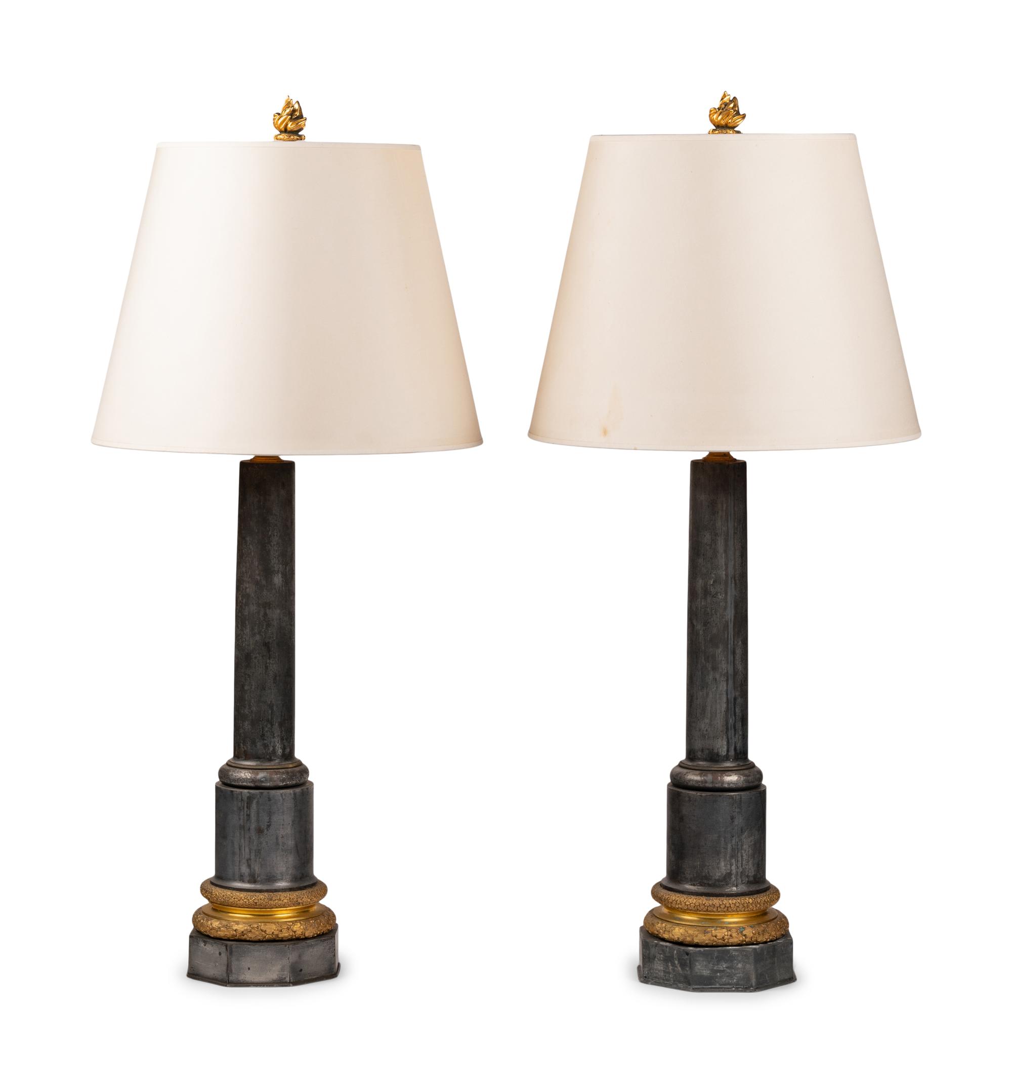 A Pair of French Gilt Bronze and Steel Columnar Lamps