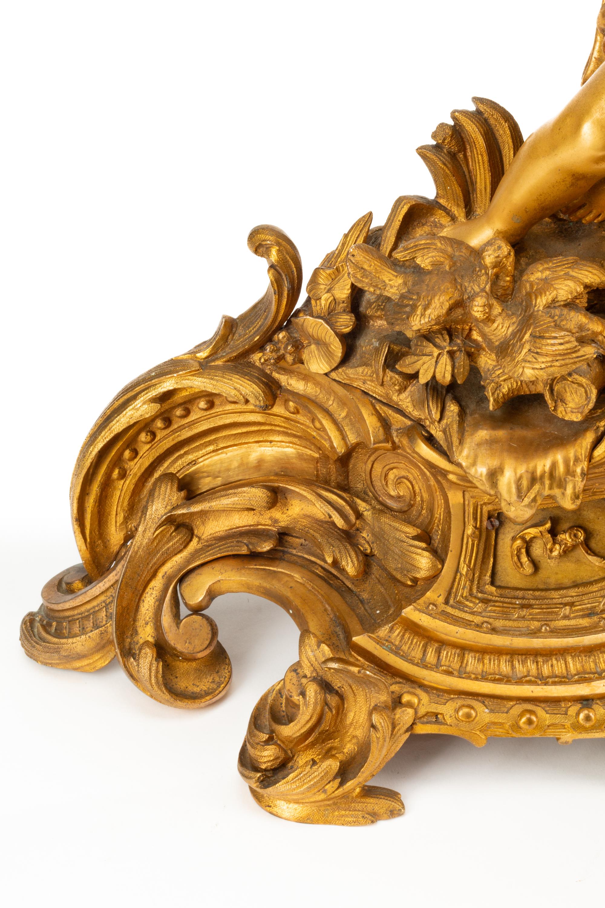 A French Gilt Bronze Figural Mantel Clock