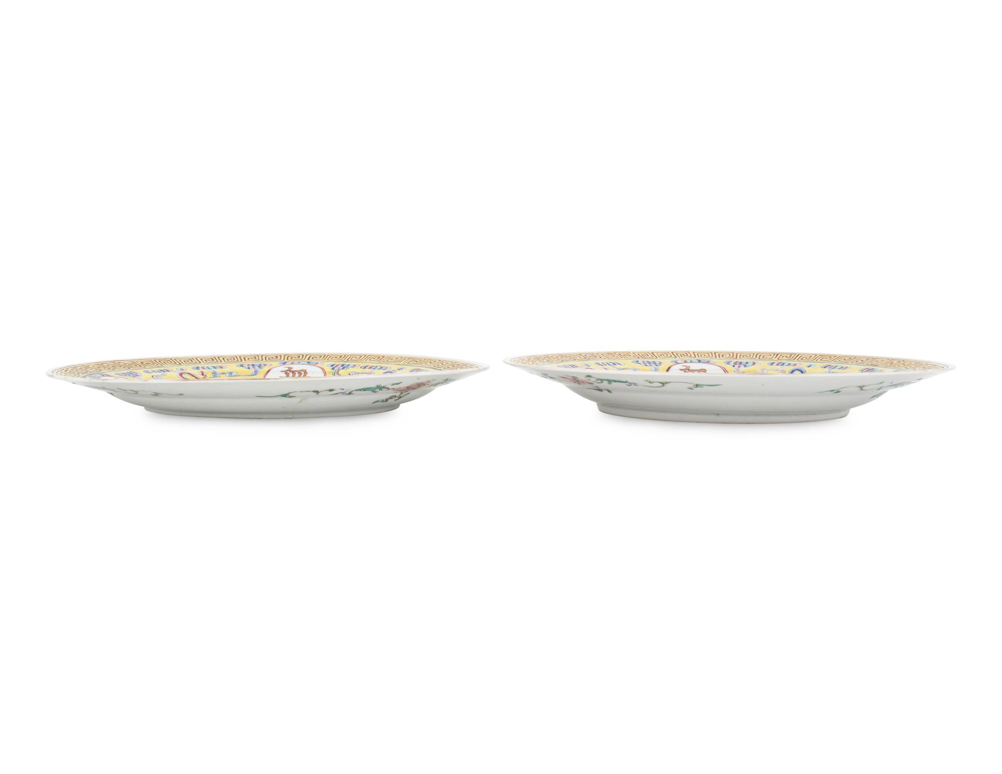 A Pair of Famille Jaune Porcelain Plates — tet