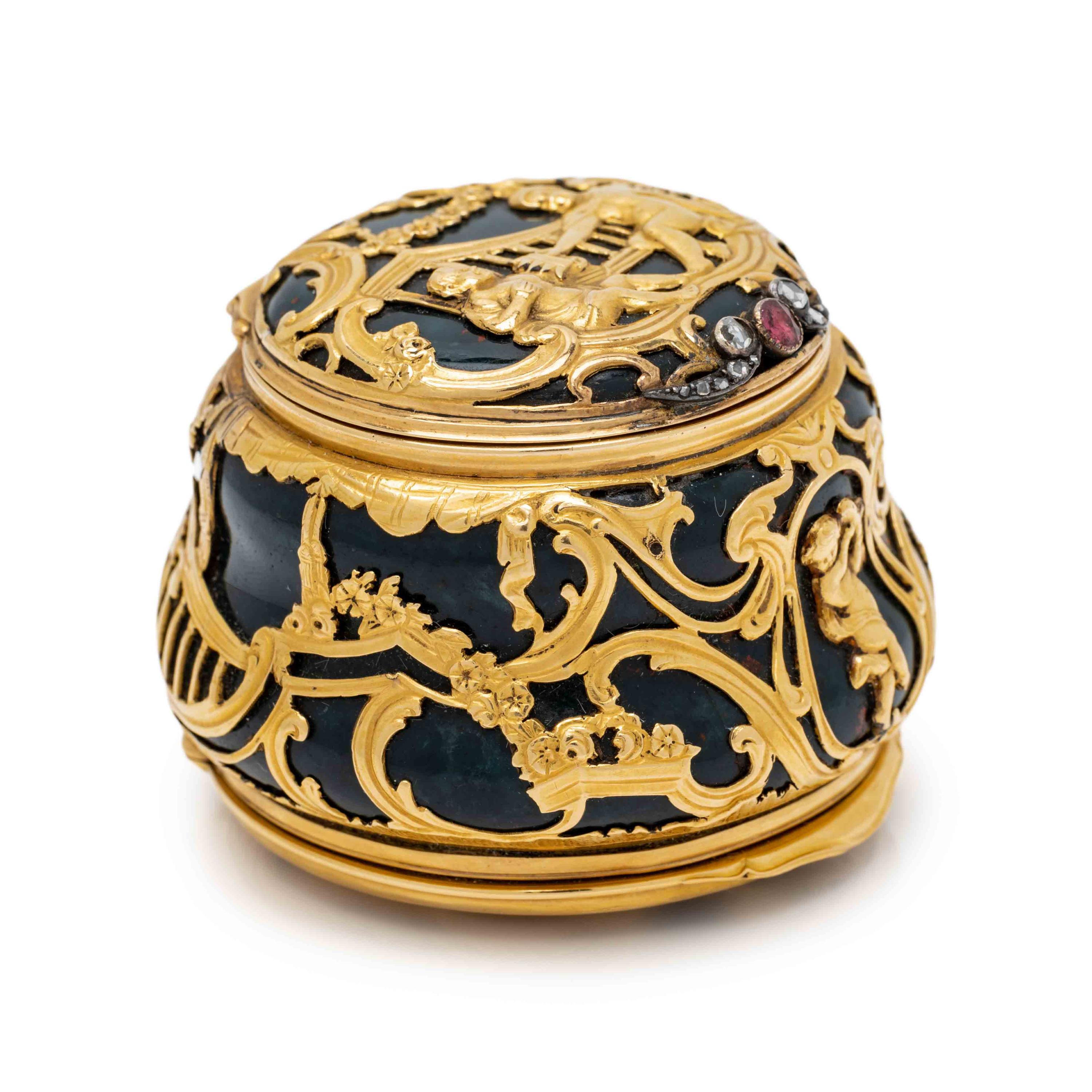 A George III Gold and Jewel Mounted Carved Bloodstone Clock-Inset Snuff Box