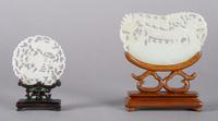 A Group of Two Jade Plaques, Width of widest 3 3/4 inches.
