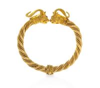 An 18 Karat Yellow Gold and Ruby Rams Head Bangle Bracelet, 39.30 dwts.