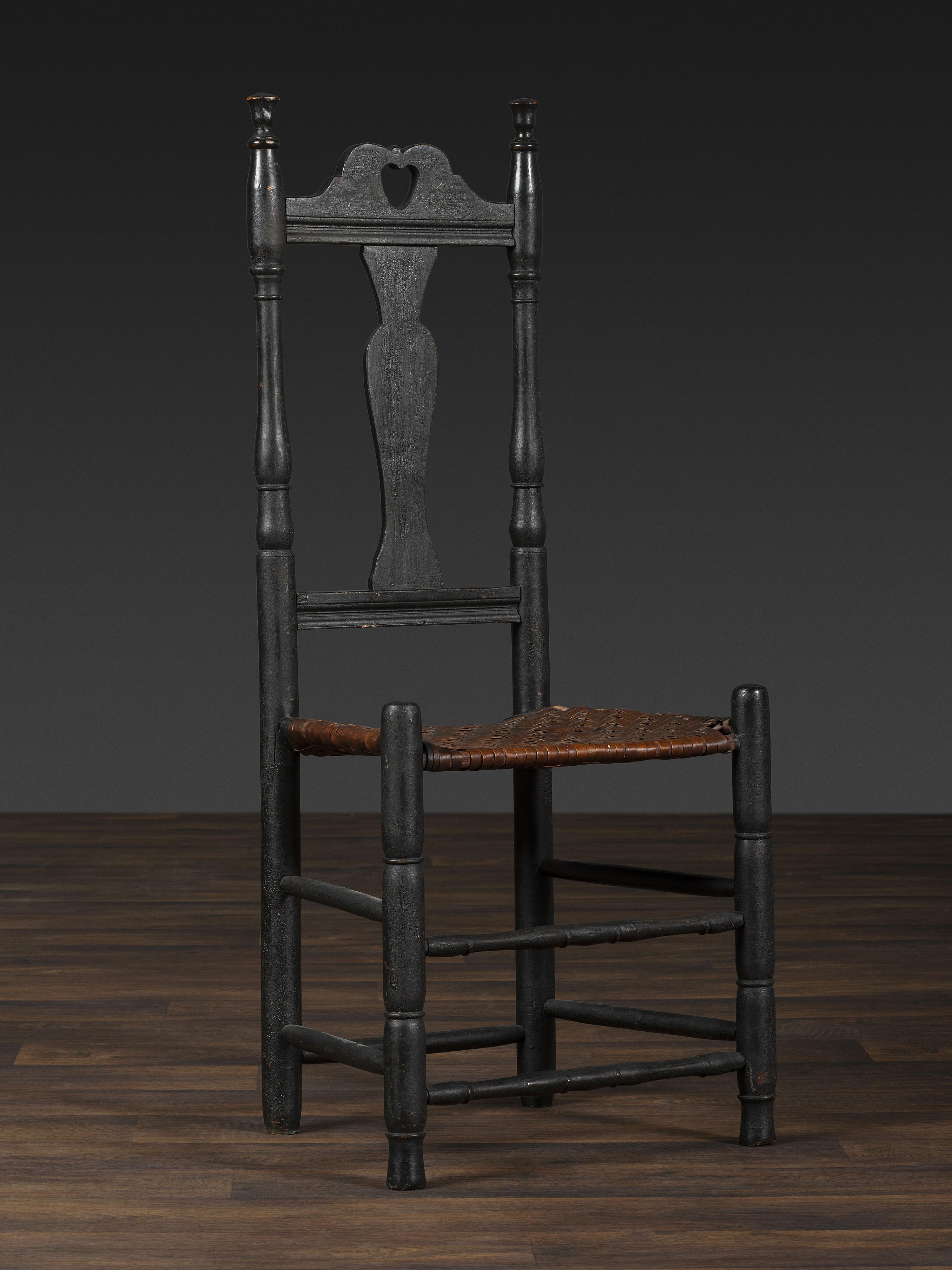 A Queen Anne Black Painted 'Heart and Crown' Splint Seat Side Chair
