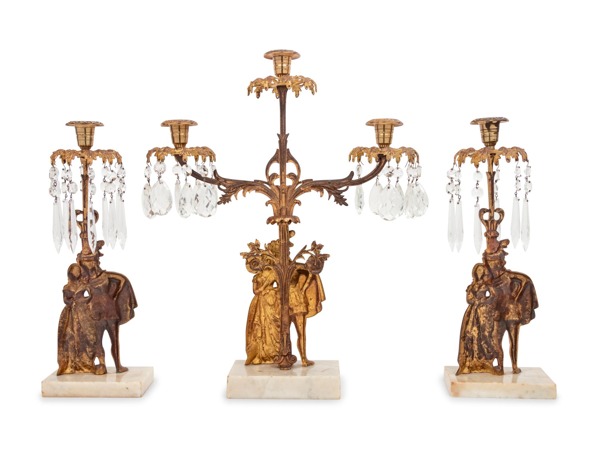 A Victorian Gilt Metal and Marble Three-Piece Garniture