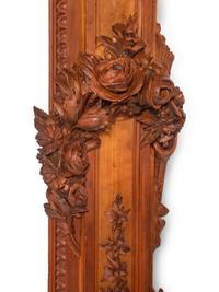 A Pair of Continental Carved Walnut Pilasters