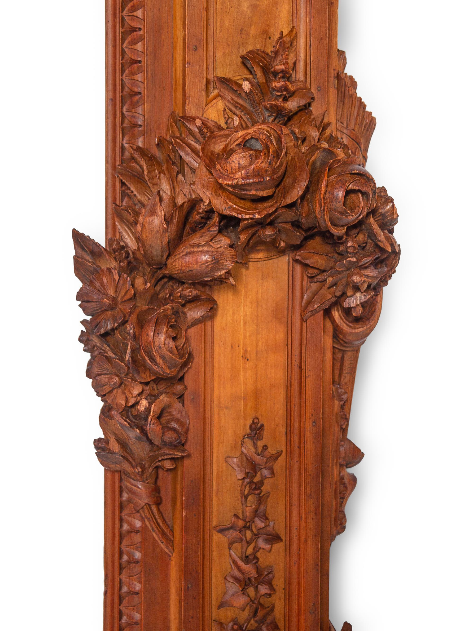 A Pair of Continental Carved Walnut Pilasters