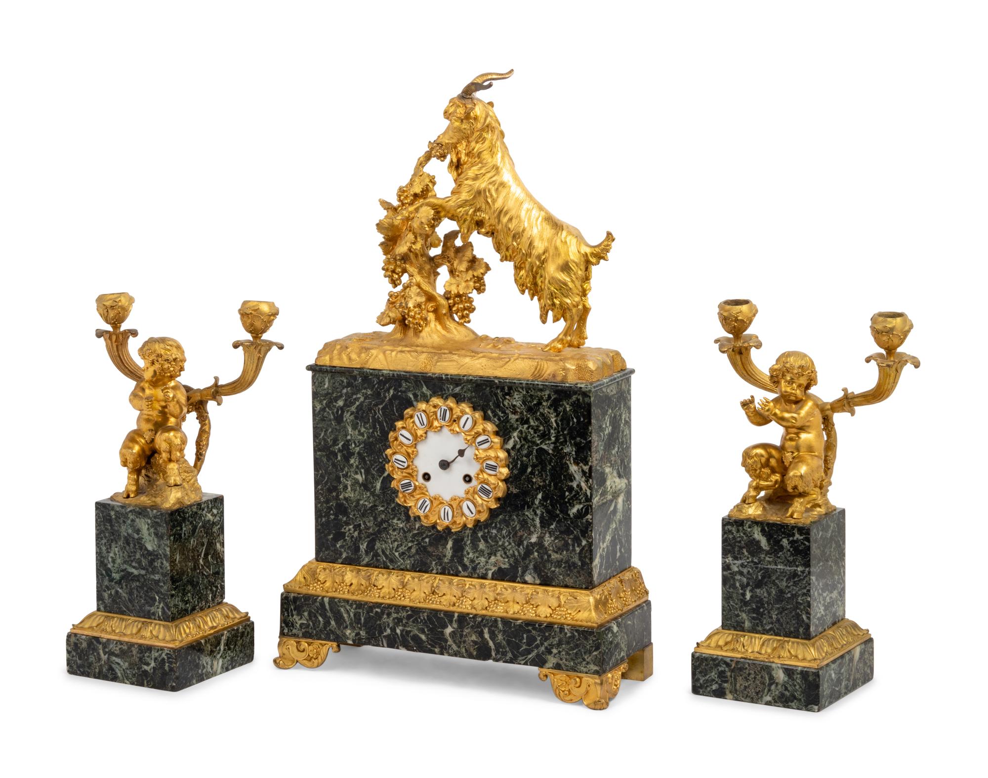 An Assembled Louis Philippe Marble and Gilt Bronze Figural Garniture