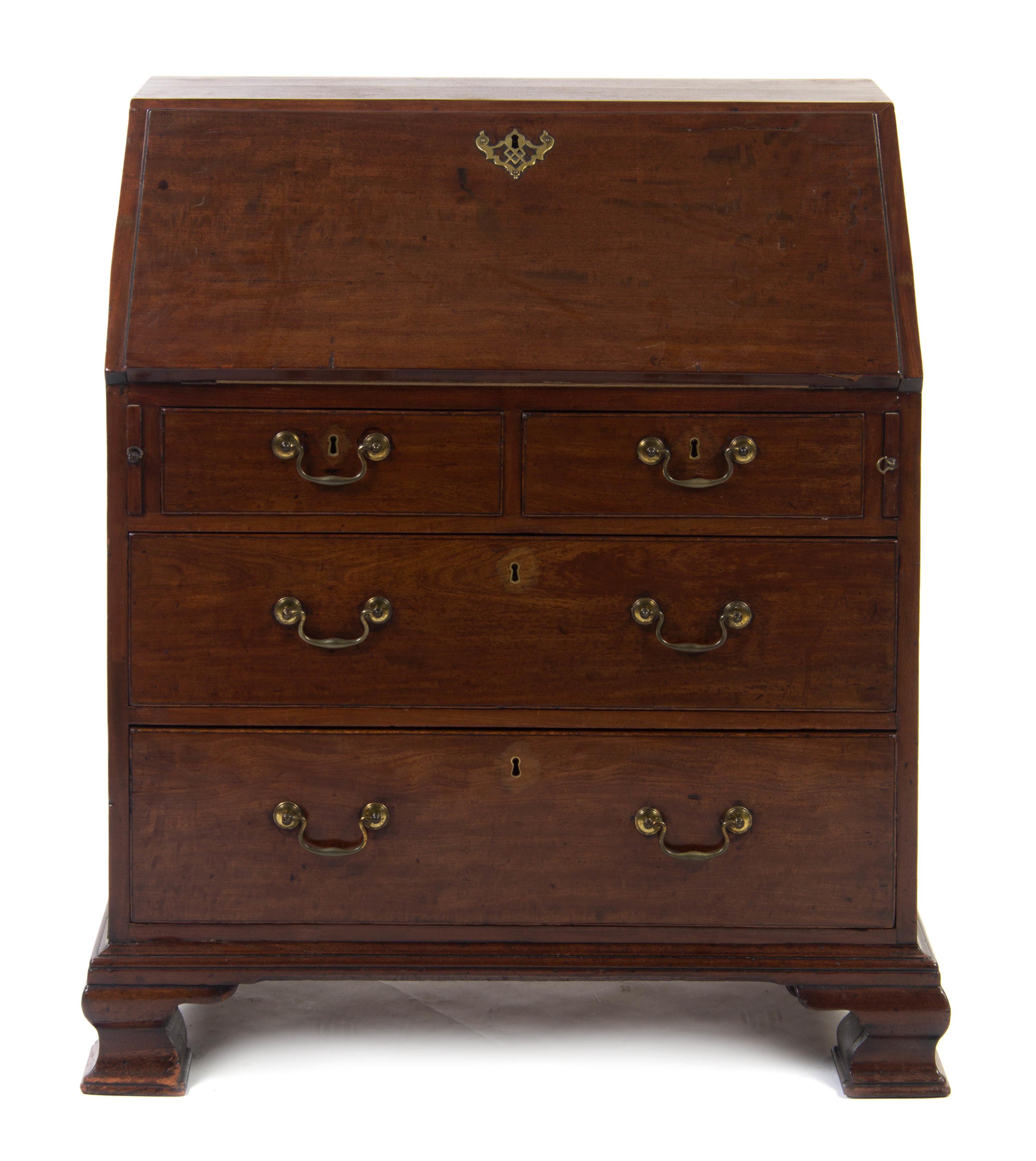 A George III Mahogany Slant Front Bureau, LATE 18TH CENTURY, Height 37 3/4 x width 32 1/2 x depth 18 1/4 inches. — LATE 18TH CENTURY,