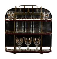 A Brass-Mounted Liquor Rack with Glasses and Tantalus