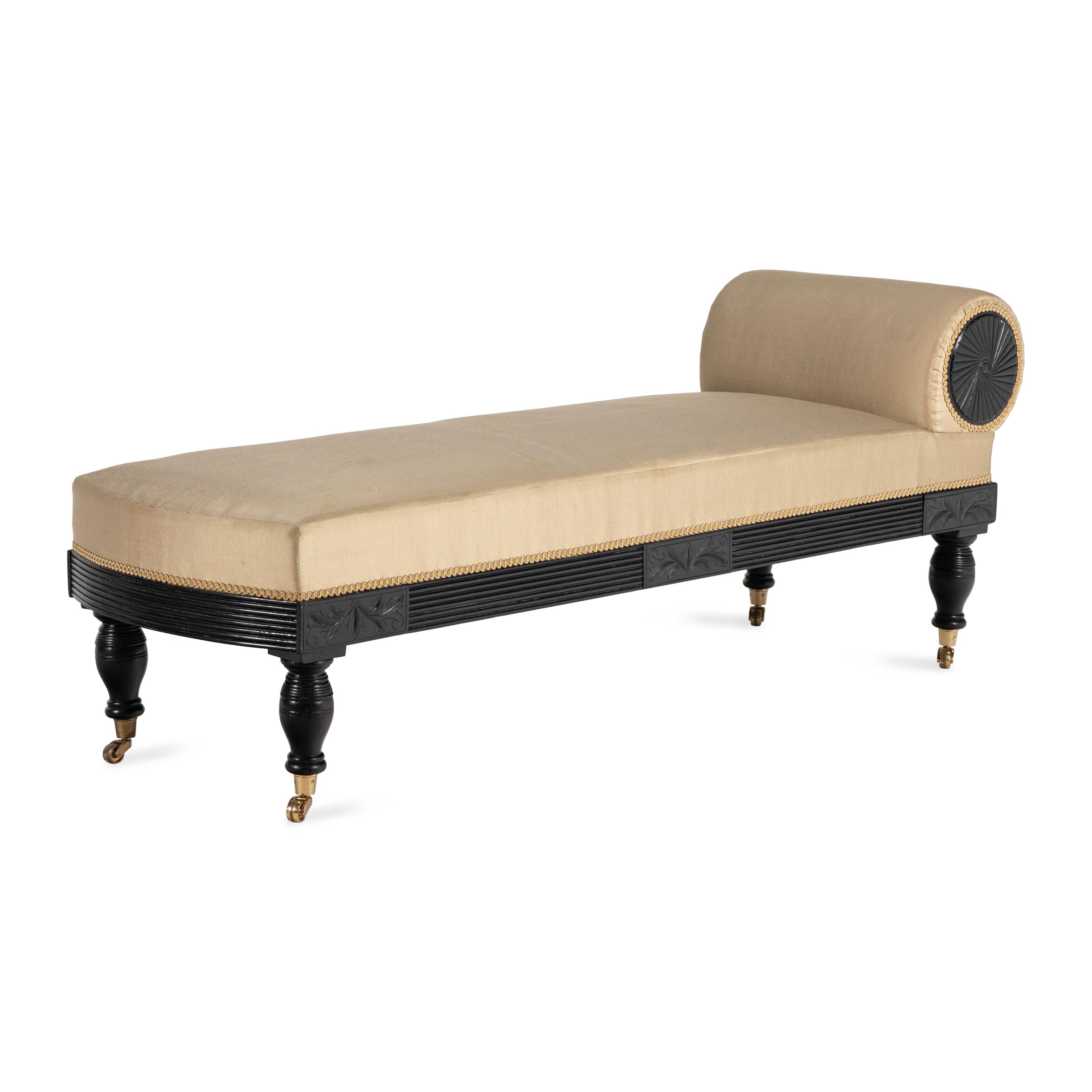 A Victorian Ebonized Chaise Longue