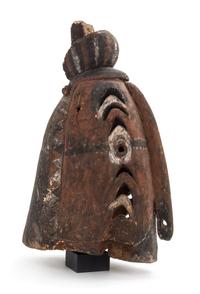 An Oceanic, Sepik River Headdress from Papua New Guinea. Height 21 1/2 x width 13 1/4 inches.
