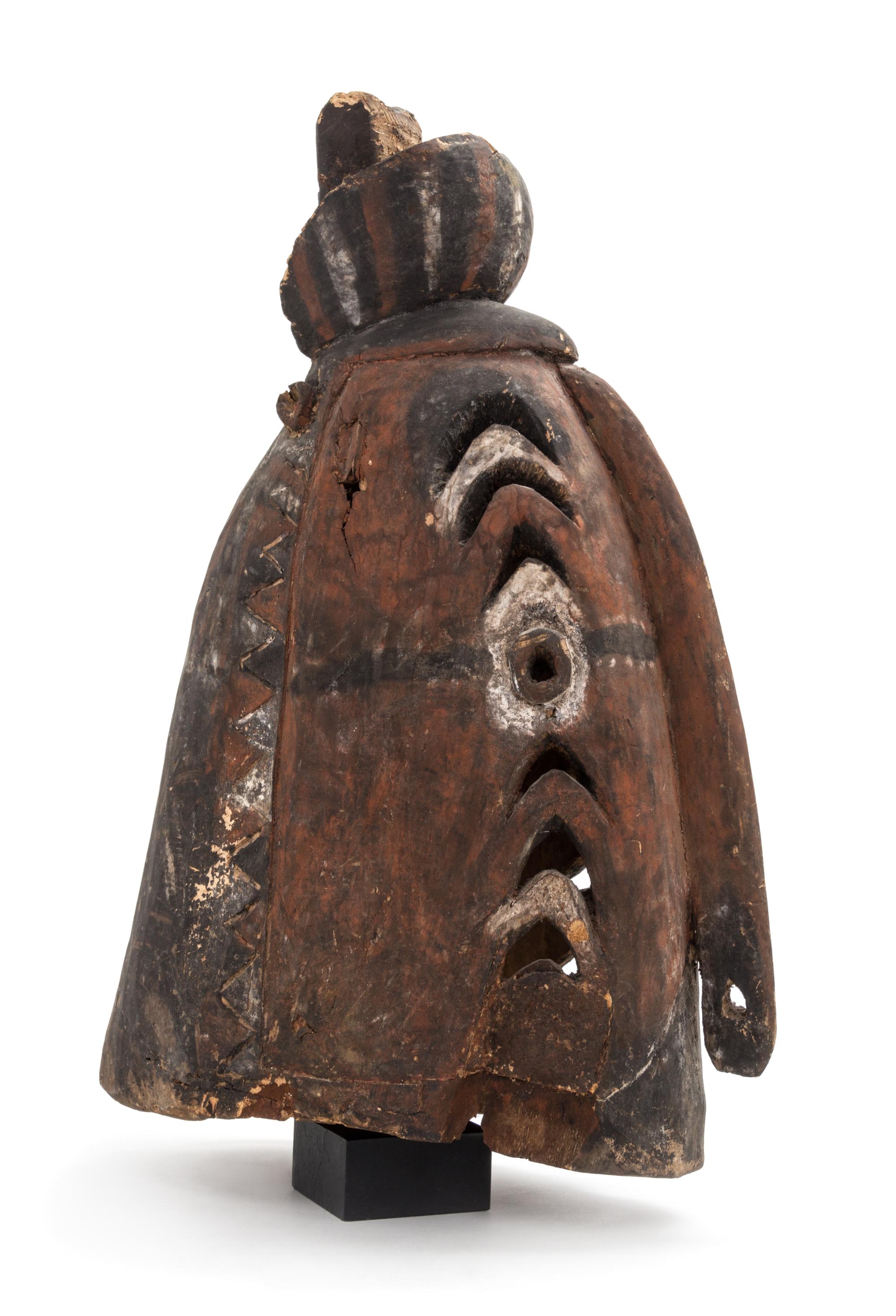 An Oceanic, Sepik River Headdress from Papua New Guinea. Height 21 1/2 x width 13 1/4 inches.