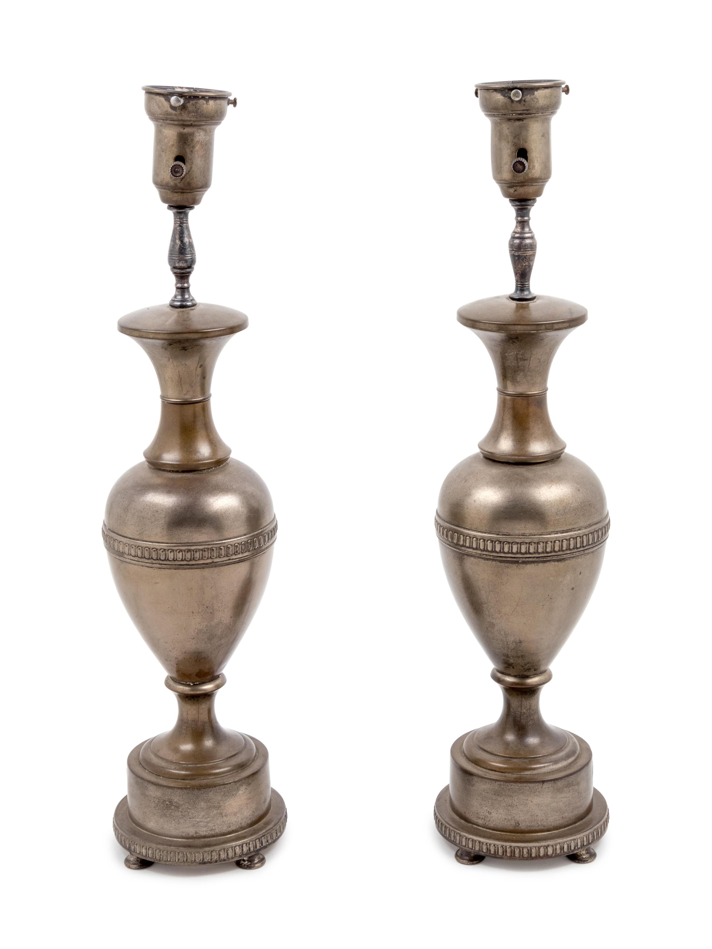 A Pair of Cast Metal Table Lamps
