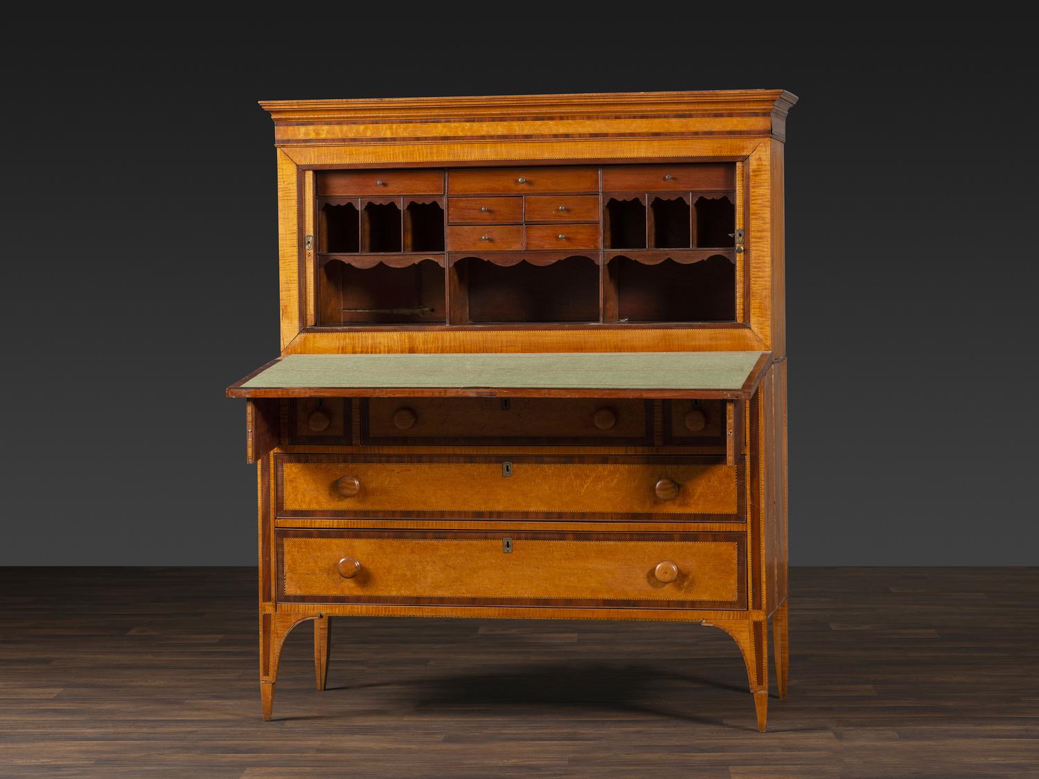 A Federal Inlaid Bird's Eye Maple and Mahogany Tambour Writing Desk