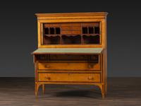 A Federal Inlaid Bird's Eye Maple and Mahogany Tambour Writing Desk