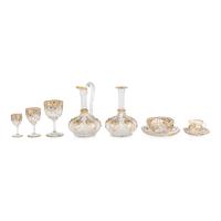 A Venetian Enameled and Gilt Decorated Glass Table Service