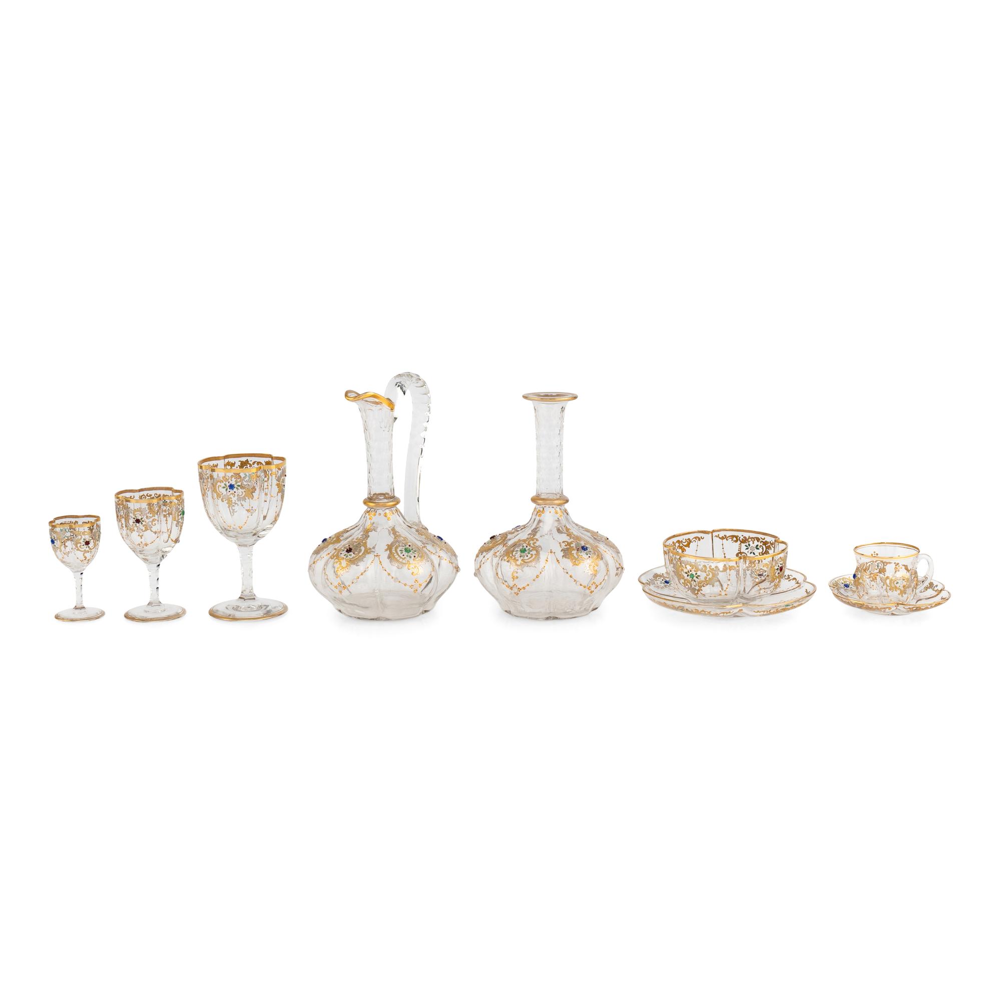 A Venetian Enameled and Gilt Decorated Glass Table Service