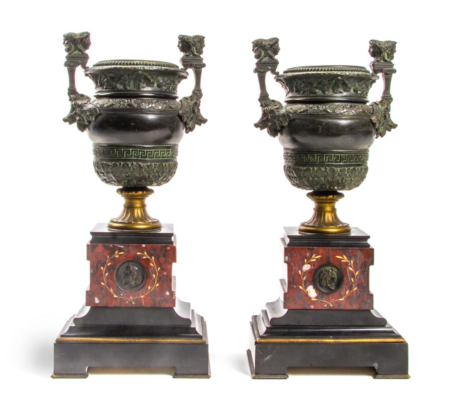 A Pair of Neoclassical Patinated Bronze and Rouge Marble Urns, Height 13 1/8 inches.