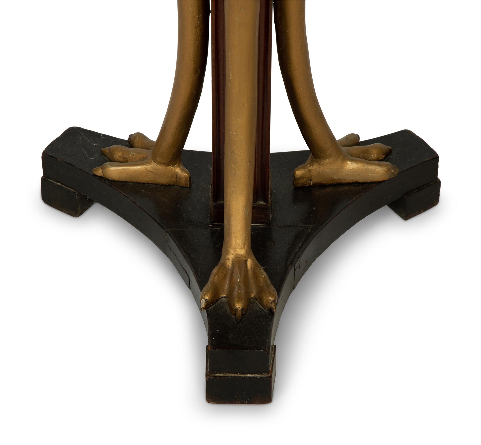 An Empire Style Parcel Gilt Mahogany Side Table