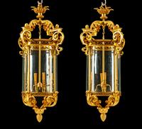 A Pair of English Gilt Bronze and Glass Lanterns