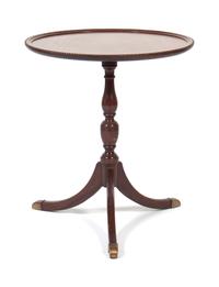 A Side Table Height 26 1/2 x diameter 23 inches.