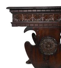 A Spanish Colonial Style Carved Walnut Desk and Chair — 19TH/20TH CENTURY