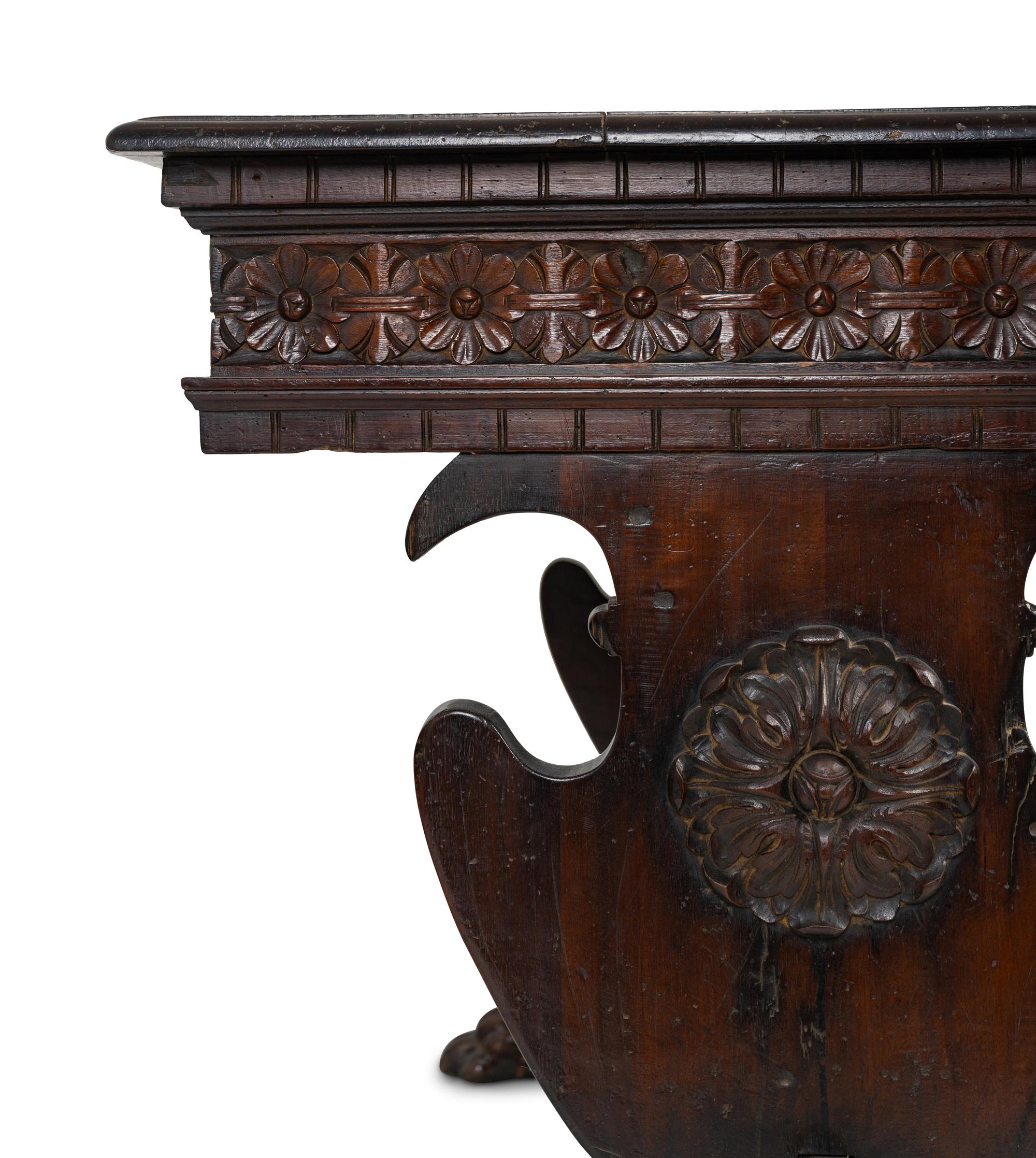 A Spanish Colonial Style Carved Walnut Desk and Chair — 19TH/20TH CENTURY