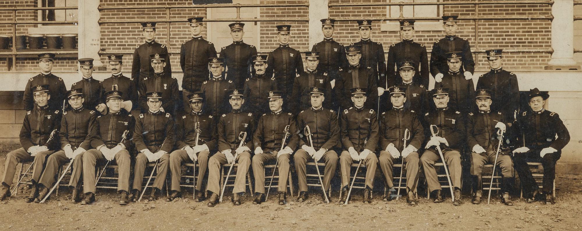 [BUFFALO SOLDIERS]. A group of 2 photographs of members of the 9th Cavalry, incl. Charles Young and George Prioleau. Fort D.A. Russell, Cheyenne, Wyoming, ca 1910s.