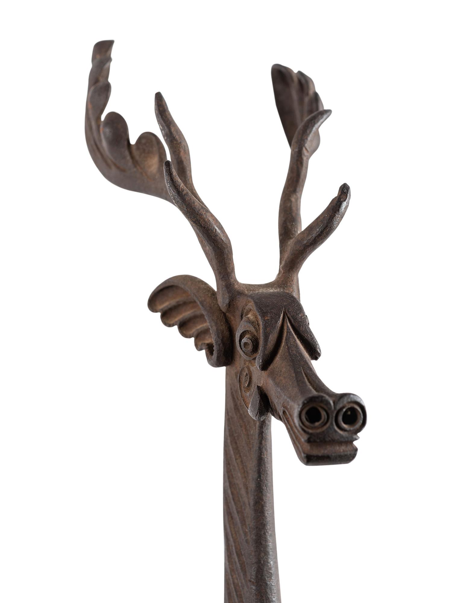 A Pair of Cast Iron Caribou Andirons